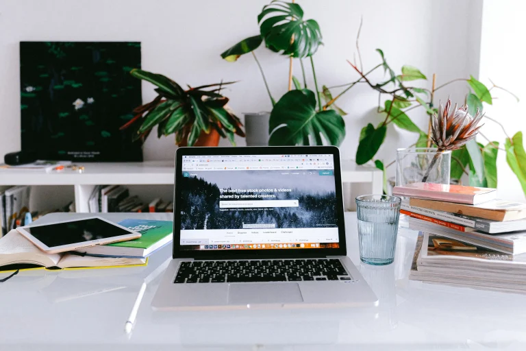 Clean home office workspace with laptop representing freelancer directory setup on BuddyPress