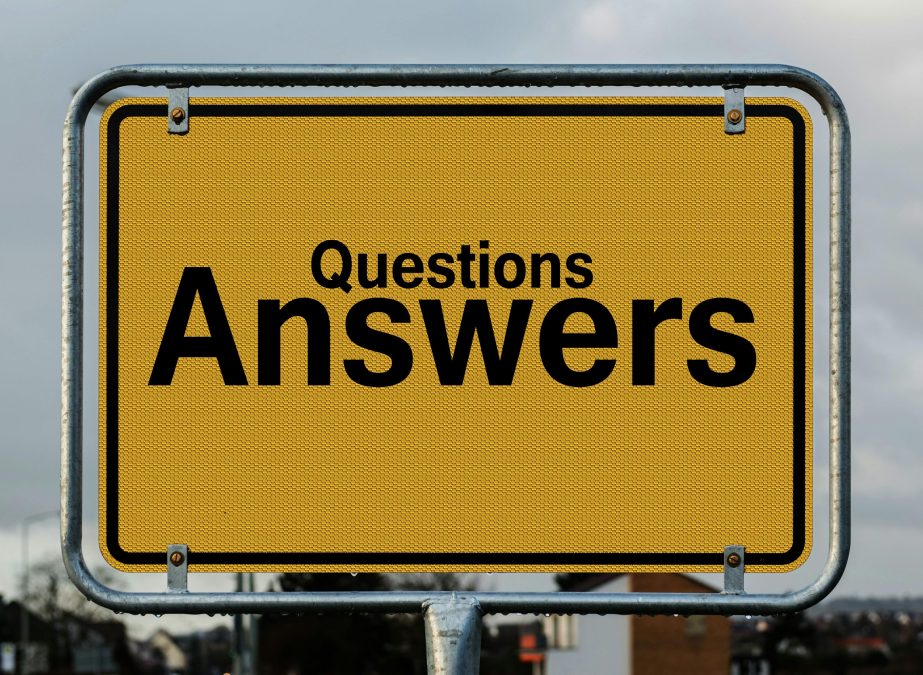 Questions and answers signpost representing a Q&A knowledge base on WordPress