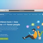 Person using laptop for online community forum discussion and engagement